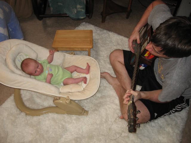 Scott Playing Guitar for Baby Ruby